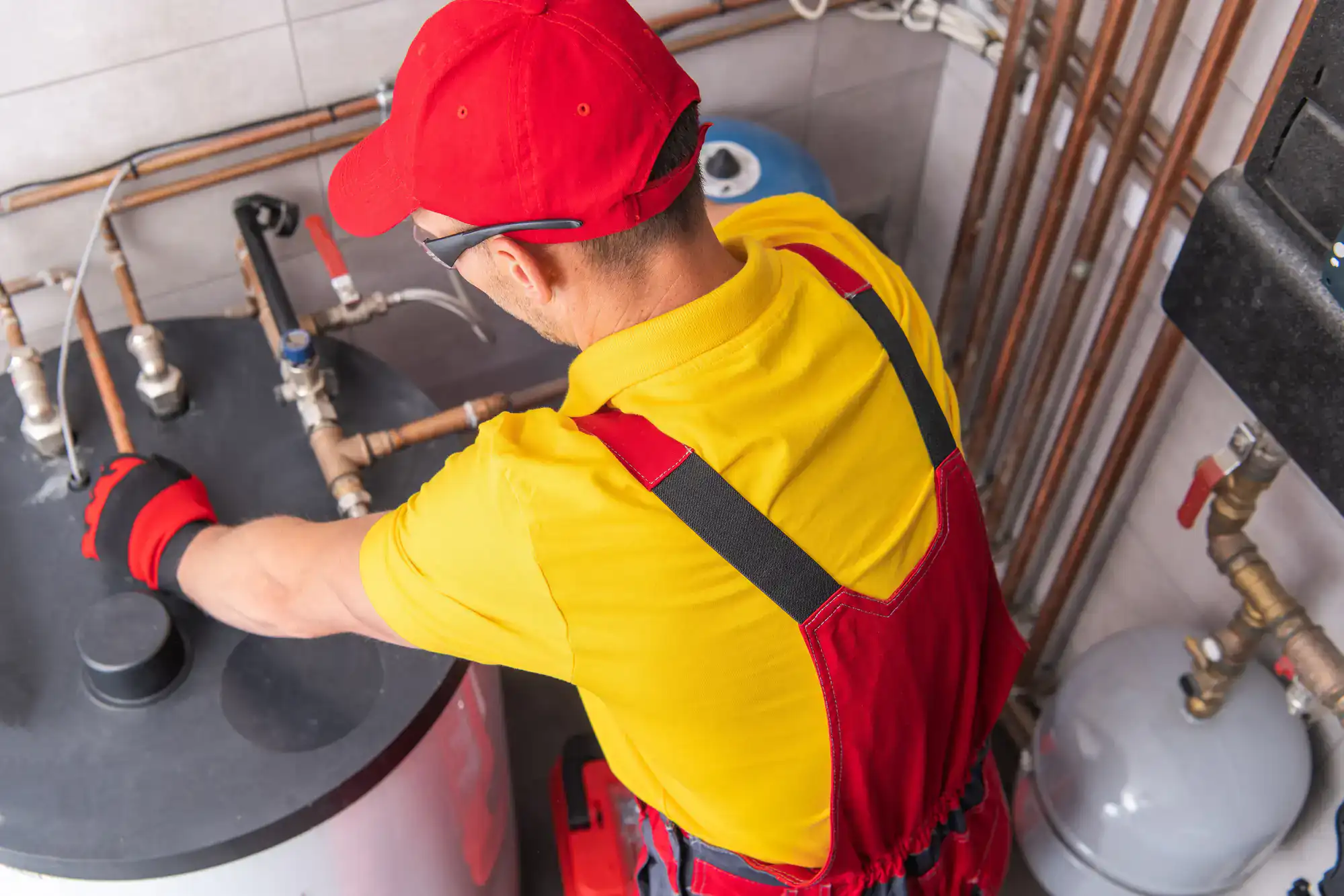 Murray Plumbing technician professionally installing a water heater in El Dorado County, CA, delivering reliable home comfort solutions